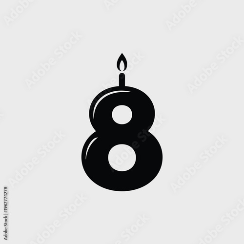 Black number eight silhouette with a burning candle on top