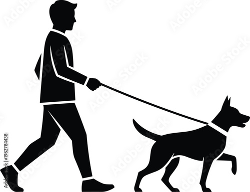 Silhouette of a man walking a dog on a leash.