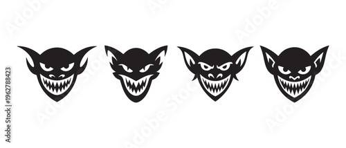 Schilderij op canvas Set of black and white devilish goblin face icons with sharp teeth and pointed ears in a minimalist graphic style