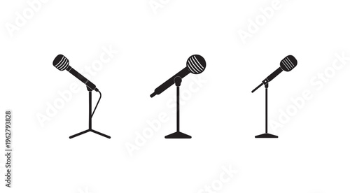 Three microphones on stands in different positions for public speaking or performance  isolated on white background