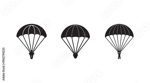Three parachutes in different positions isolated on white background  descending slowly through air  sports and adventure concept