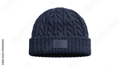 Close-up of a textured navy blue knitted beanie hat with a blank rectangular patch for branding with winter hat