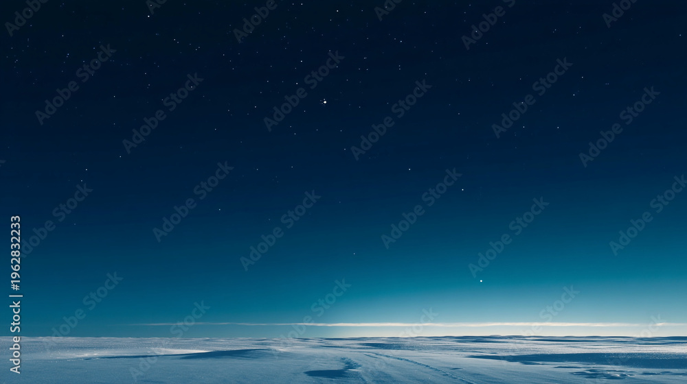 Fototapeta premium A serene and vast winter landscape under a starry night sky