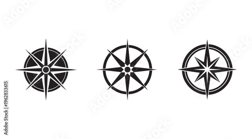 Set of three different black and white compass rose navigation symbols with multiple points and circular outline on white background