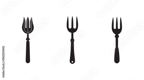 Three black fork utensils with different prong and handle designs on white background  eating tools
