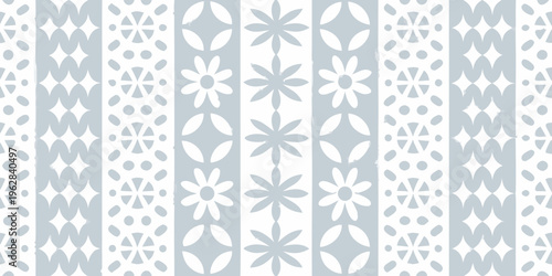 Pale blue and white geometric pattern with floral and circular motifs