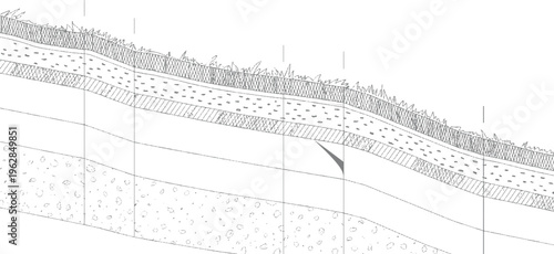Cross section of layered soil strata with grass on and geological formations layers