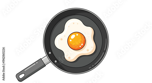 Perfectly fried egg with a bright yellow yolk cooking in a professional black non-stick frying pan isolated on a white background.