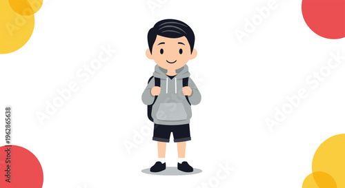 Cheerful little boy with dark hair wearing a comfortable grey hoodie and black shorts stands ready for school with a backpack on.