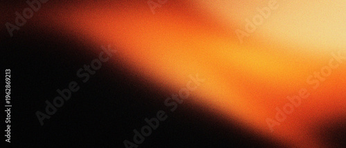 Quadro su tela Vintage light leak texture with warm orange glow on black background