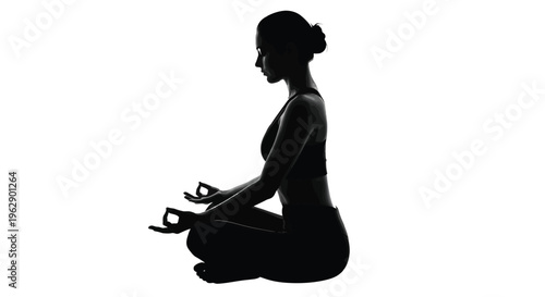 Silhouette of a serene woman meditating in a yoga pose, finding inner peace and mindfulness.