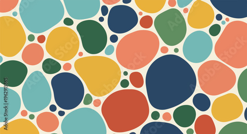 A colorful, organic pattern featuring various rounded shapes and hues