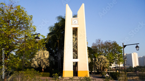 Classic building clock tower antique retro vintage style in Somdet Phra Srinagarindra Park or Suan Somdet Ya Public Garden for thai people traveler visit rest relax at Pak Kret in Nonthaburi, Thailand