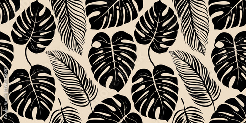 Black monstera leaves create a seamless tropical pattern on beige