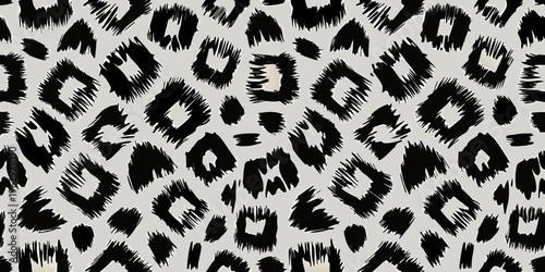 Abstract black and white leopard print pattern fills the entire frame