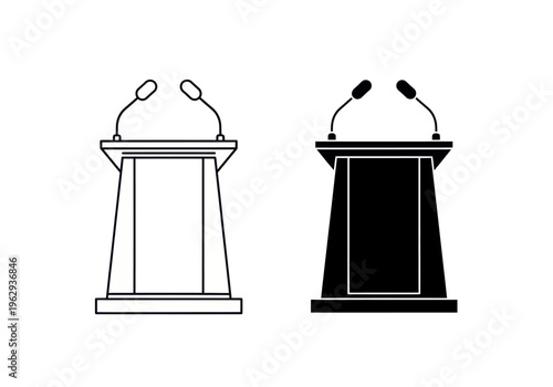 Two podiums with microphones are shown side by side on stage