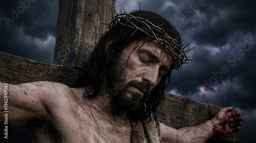 Jesus Christ, suffering on the cross, crucifixion on Golgotha, wearing a crown of thorns, dramatic portrayal of his ultimate sacrifice, passion, somber stormy sky