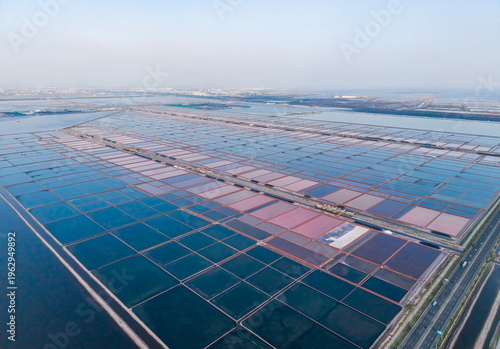 Aerial view of the colorful salt fields and salt-making site by the coast of Tianjin	