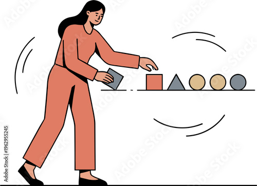Woman stacking geometric shapes on a shelf indoors with focus