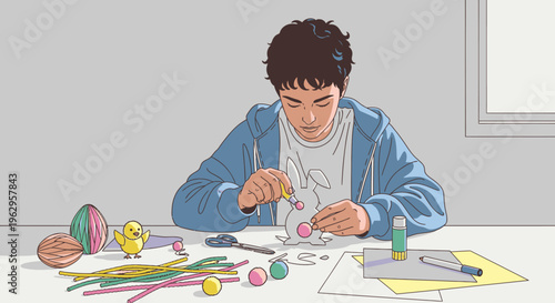 Young man sitting at a table, crafting colorful paper shapes and objects with scissors and glue in a well-lit room.