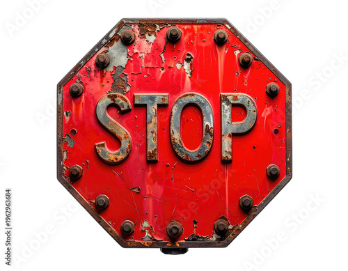 Weathered octagonal metal sign with raised 'STOP' letters, bolted