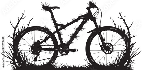 Black bicycle with thorns on frame and grass bike mountain bike