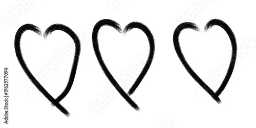 Three black heart shapes on a white background