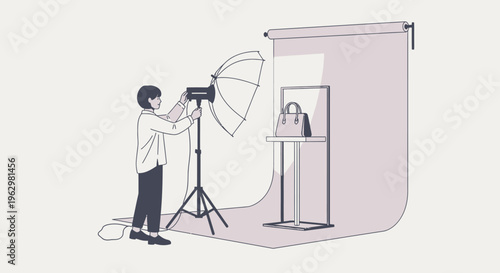 Professional Product Photography Studio Setup with Photographer Adjusting Light for Handbag Shoot