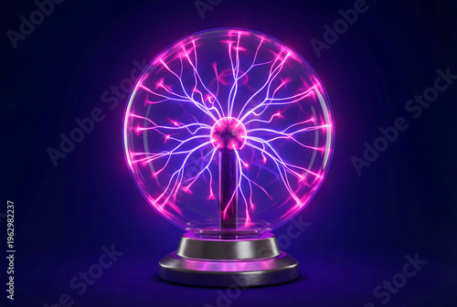 Plasma ball with glowing pink and purple electrical discharges on a dark