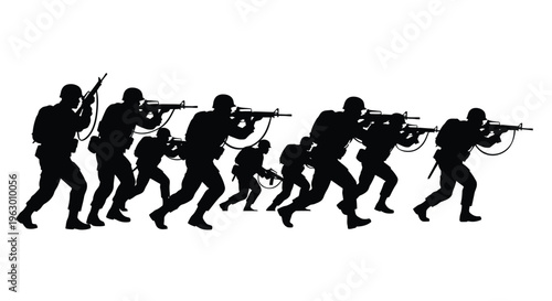 Soldiers in tactical formation advancing with guns