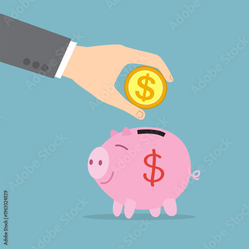  Hand putting coin money into piggy bank.