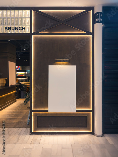 Modern cafe entrance with blank poster ready for design