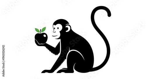 Black Monkey Holding a Green Apple with Leaves.