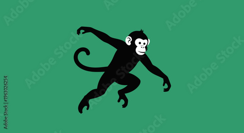 Black Monkey Swinging with Playful Pose on Green Background.