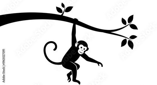 Silhouette of a playful monkey hanging from a tree branch.