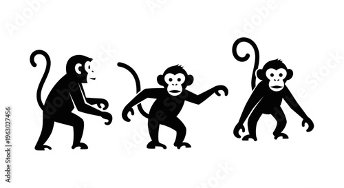 Three Silhouettes of Monkeys in Different Poses.
