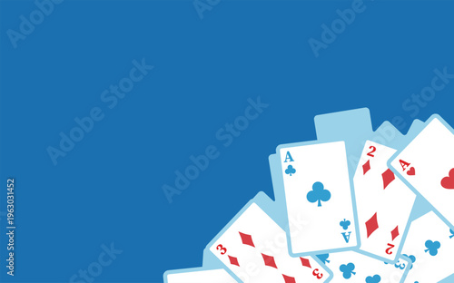 散らばるトランプの青い背景フレーム（コピースペース付き）