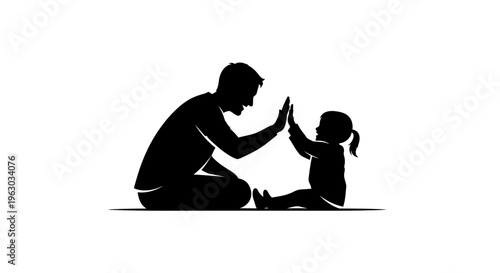 Father and Daughter Silhouette Giving High Five.