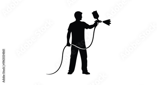 Man operating a spray gun depicted in stark black silhouette