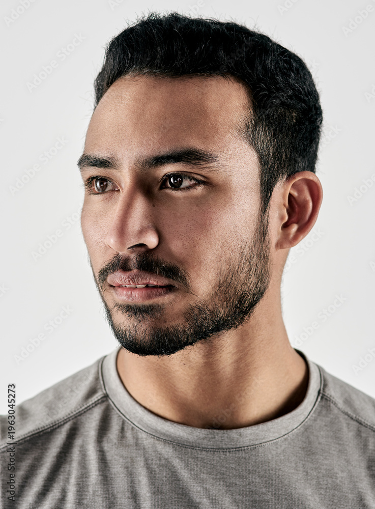 Obraz premium Serious, thinking and athlete with fitness in studio for reflection, exercise pride and healthy body. Personal trainer, bodybuilder and membership for training, sportswear and man on white background