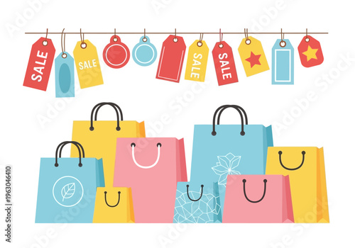 Colorful shopping bags and hanging sale tags on a white background