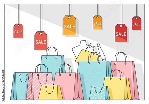 Colorful shopping bags piled below hanging red and orange sale tags