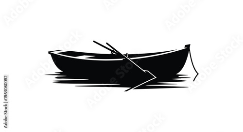 A striking black silhouette depicts a small rowboat gently floating on calm water creating a peaceful scene silhouette high quality professional