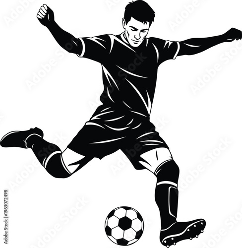 Silhouette of a soccer player kicking a ball in mid action