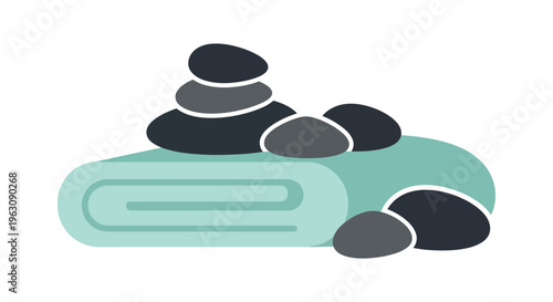 Stacked stones on rolled towel in minimalist calm setting for wellness