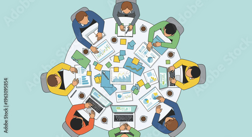 Business people sitting around meeting table.