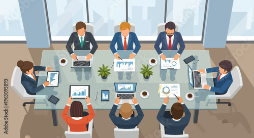 Business people sitting around meeting table.