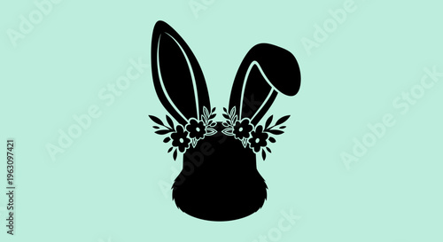 Black silhouette of a bunny head with a floral wreath.
