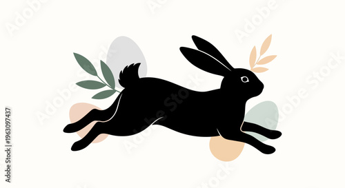 Black rabbit running with energy and grace.