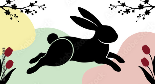 Black silhouette of a rabbit jumping with energy and grace.
